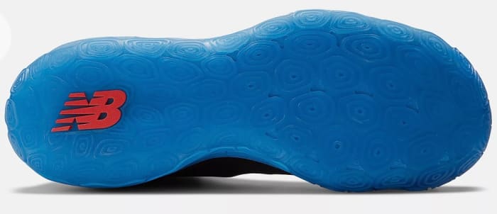 View of blue outsole of New Balance shoe.